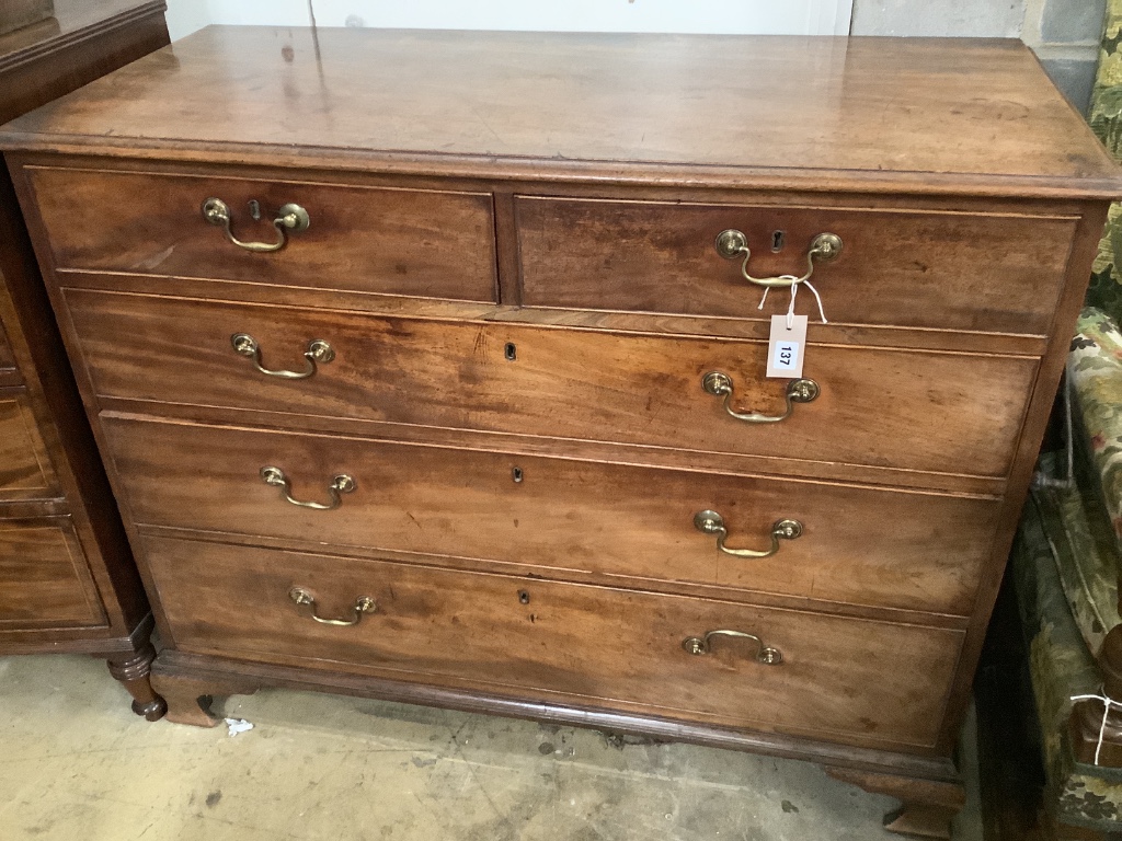 A George III mahogany chest fitted two short drawers and three graduated long drawers, width 114cm depth 52cm height 92cm